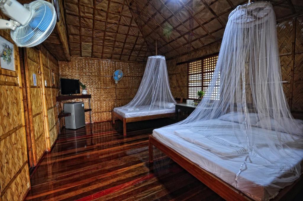 Villa De Pico Highland Beach Resort Puerto Galera Kamer foto